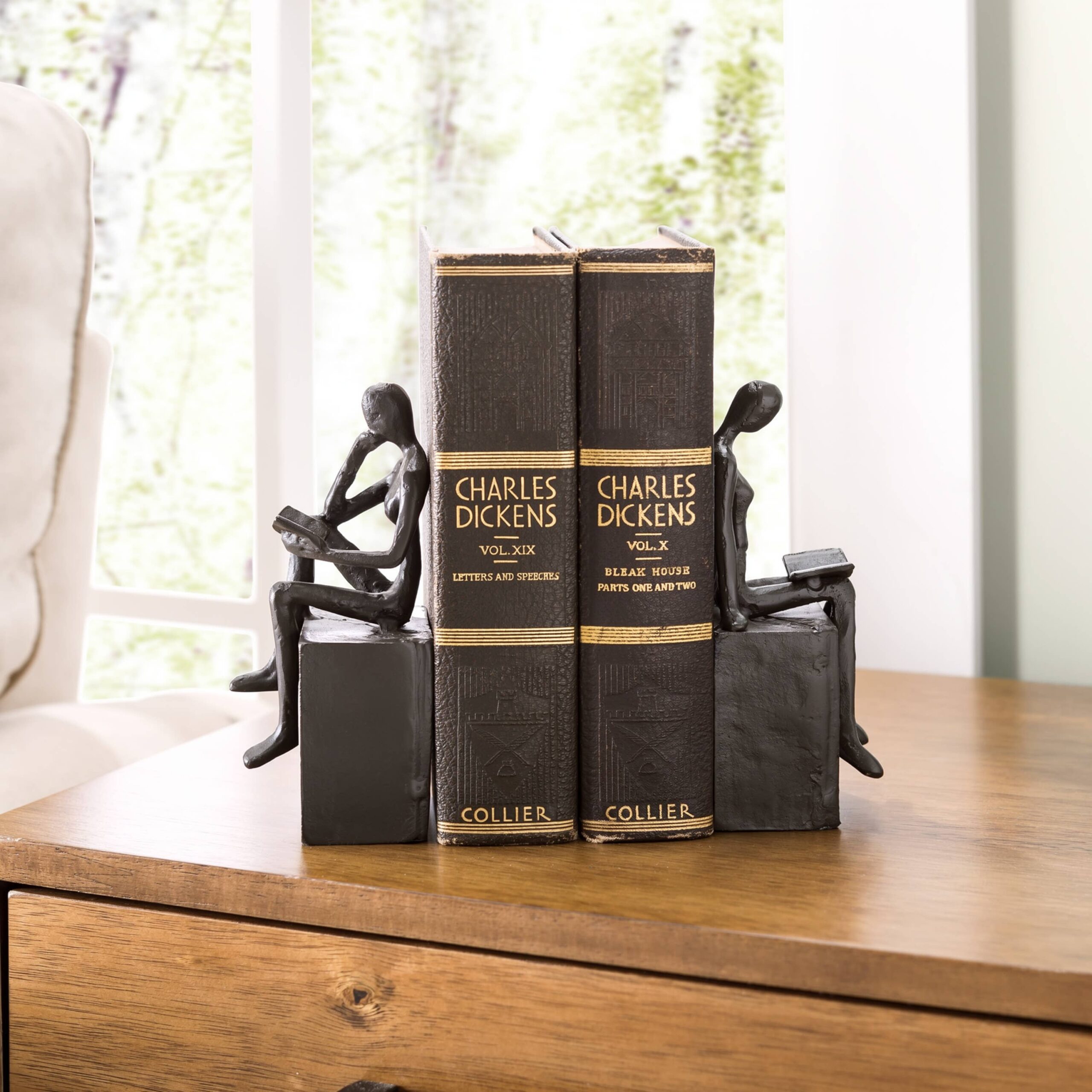 Man and Woman Reading On A Block Cast Iron Bookend Set